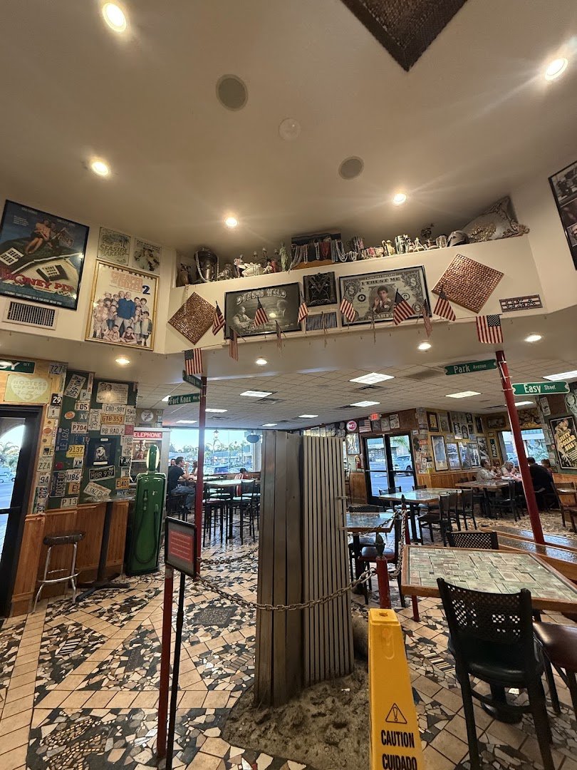Quirky American restaurant interior with simple tables.